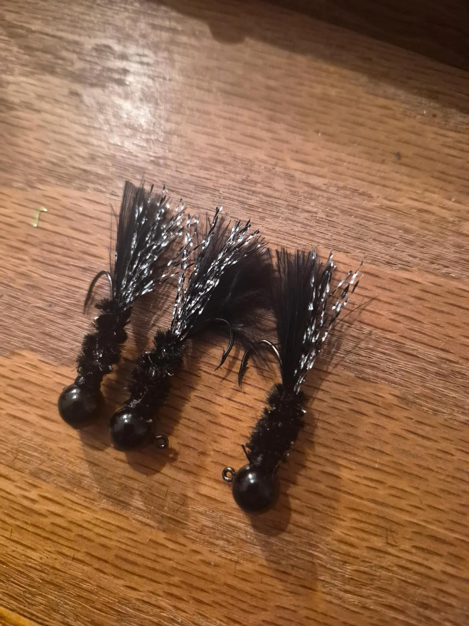 Black Widow jig � black fishing lure with silver flash