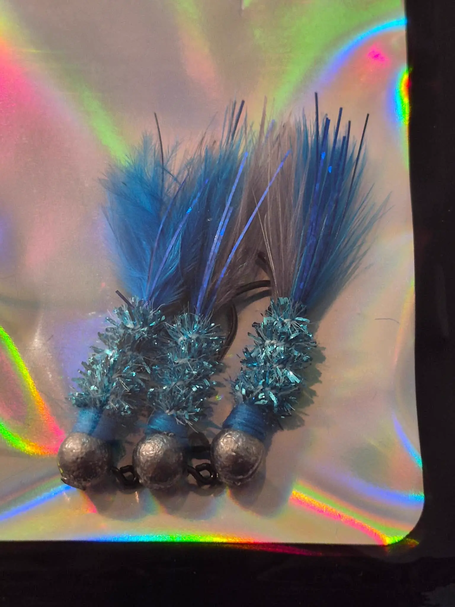 Peacock jig — blue and teal fishing lure